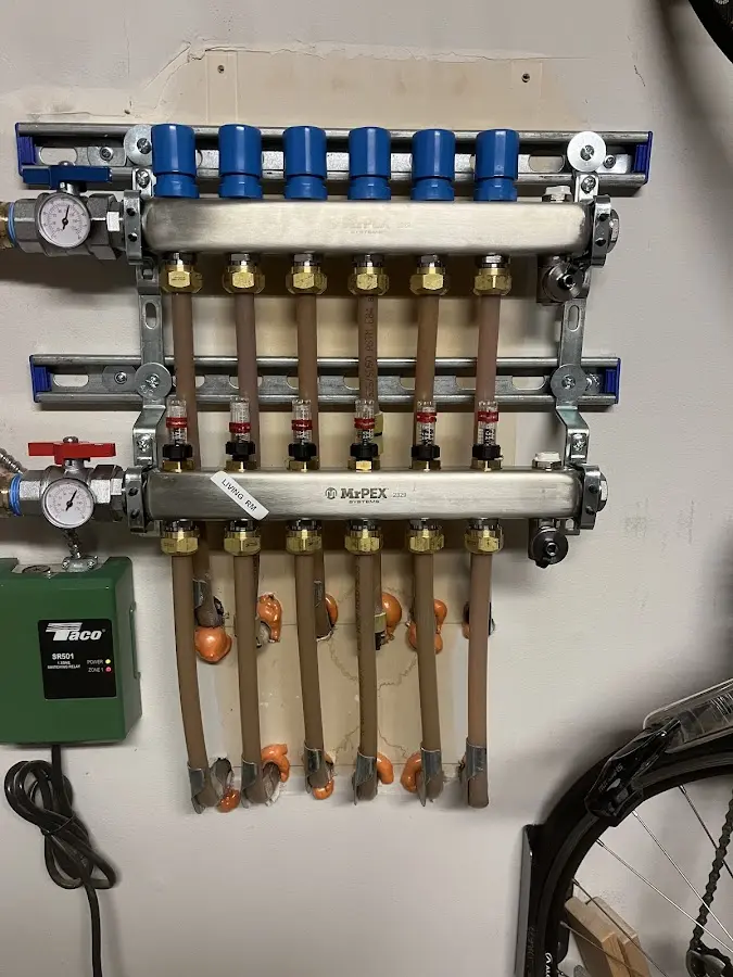 Plumber performing Water Heater Repair at a residential property in Haworth